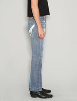 'Love Will Tear Us Apart' Jeans in Light Blue.