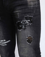 Graffiti Ripped Black Jeans with Irregular Wash