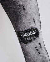 Irregular Wash Ripped Black Jeans with Black Patches