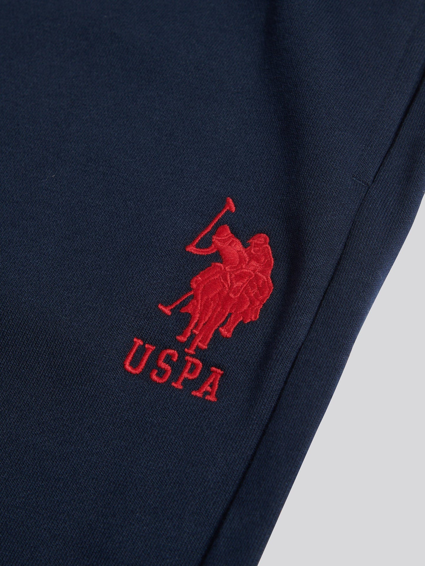 Mens Player 3 Loopback Jogger in Dark Sapphire Navy / Haute Red DHM