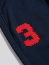 Mens Player 3 Loopback Jogger in Dark Sapphire Navy / Haute Red DHM