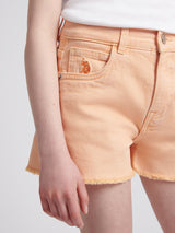 Girls Wash Denim Shorts in Peach Nectar