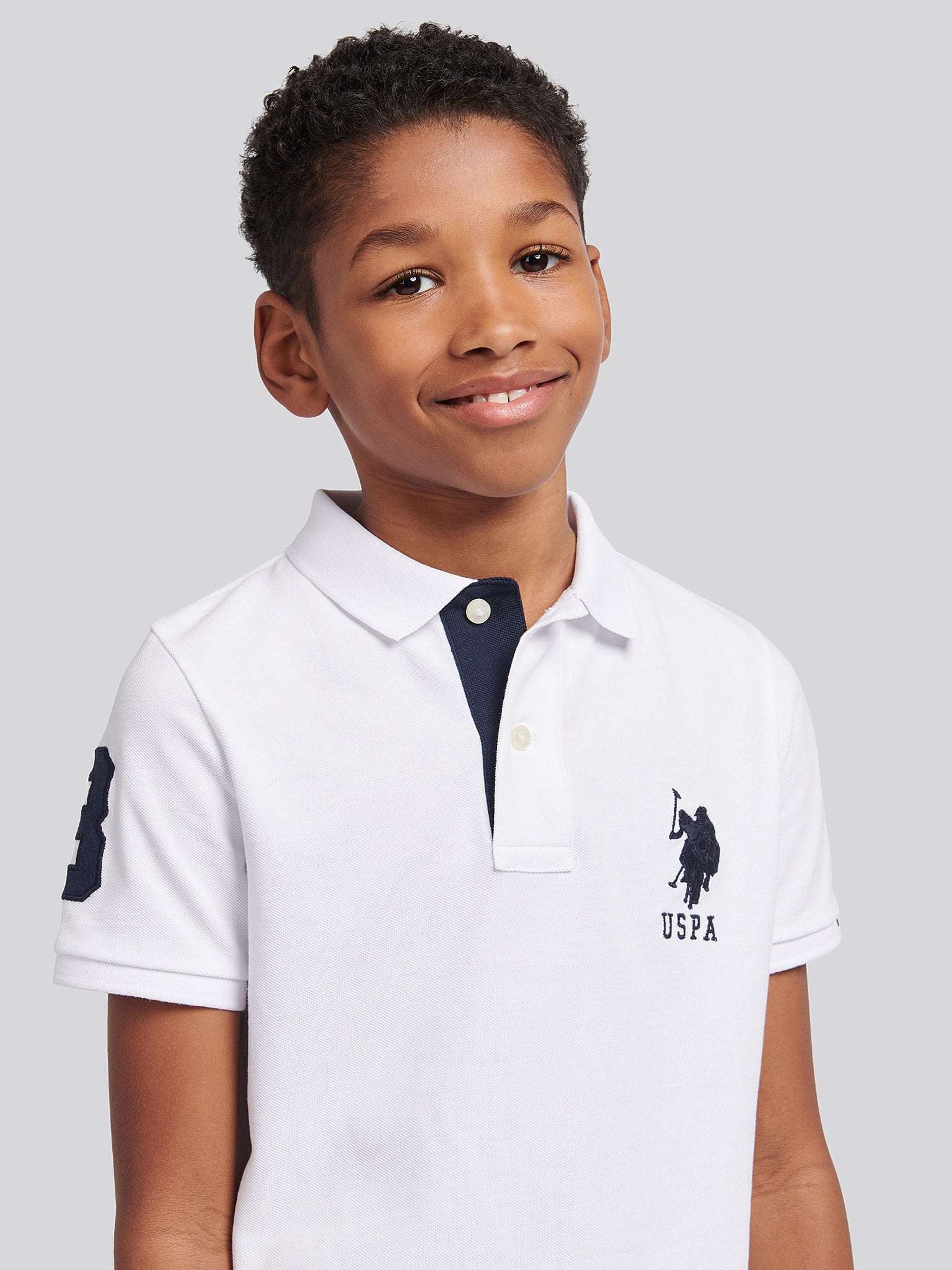 Boys Player 3 Polo Shirt in White / Dark Sapphire Navy DHM