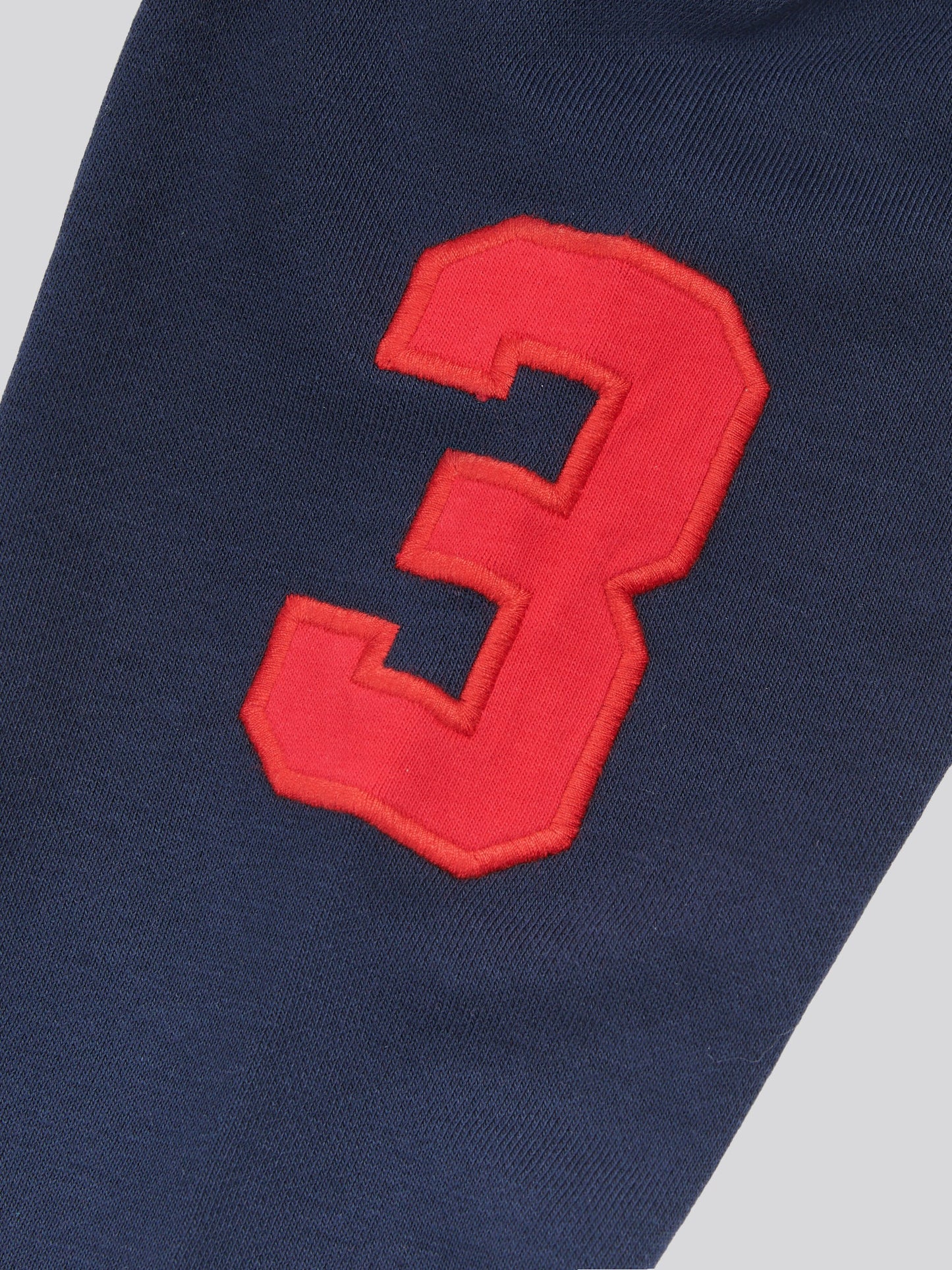 Boys Player 3 Brush Back Hoodie in Dark Sapphire Navy / Haute Red DHM