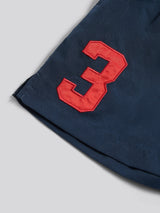 Boys Player 3 Swim Short in Dark Sapphire Navy / Haute Red DHM