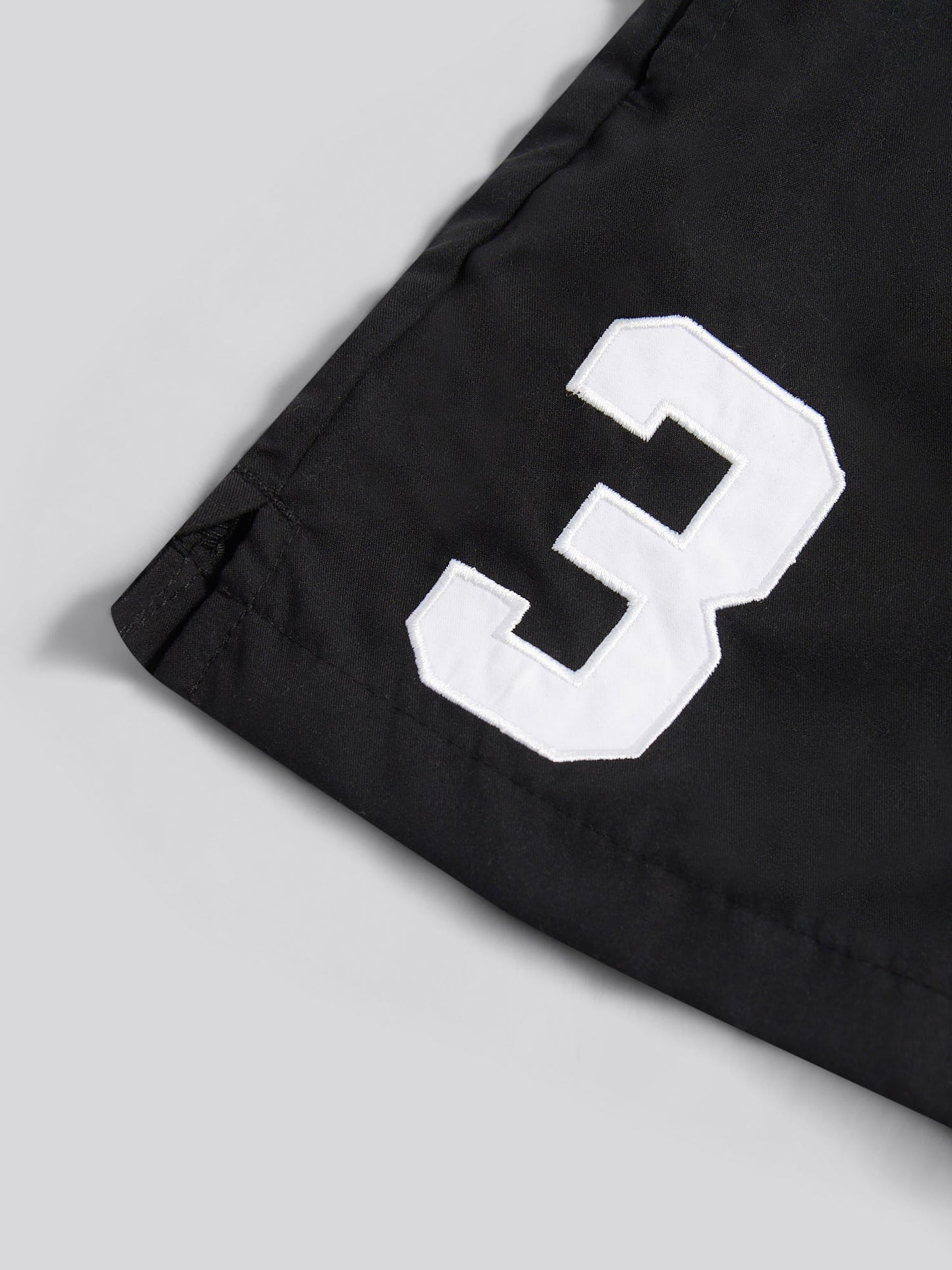 Boys Player 3 Swim Short in Black Bright White DHM