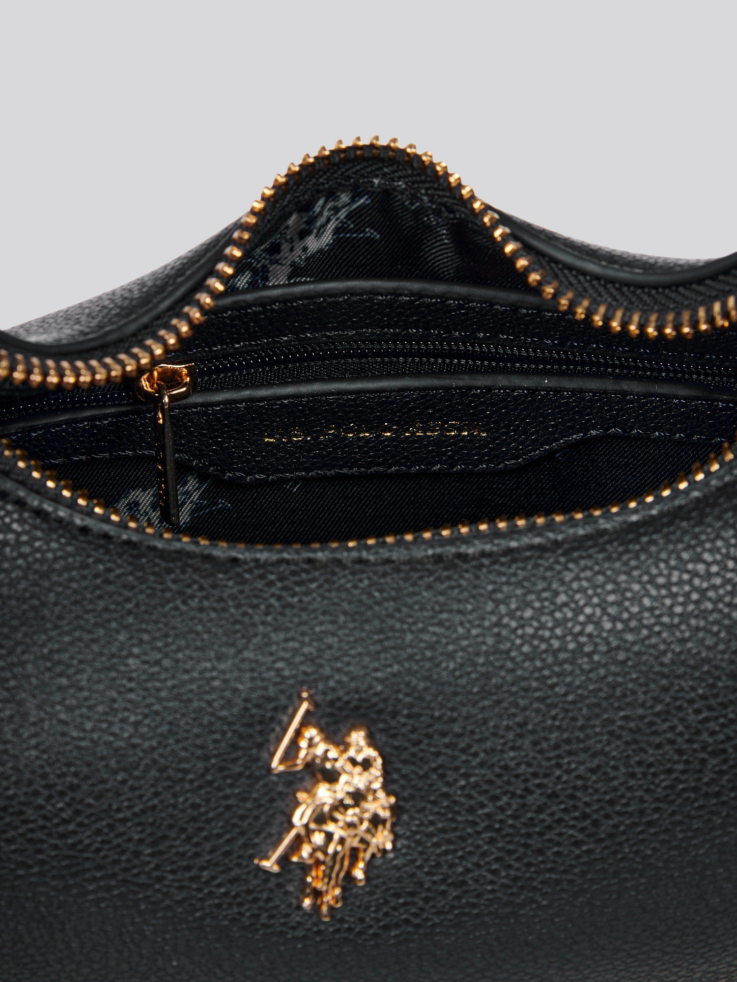 U.S. Polo Assn. Womens Jones Small Round Hobo Bag in Black