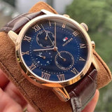 Tommy Hilfiger Men’s Watch Leather Brown Strap With Blue Dial And Gold Case 1791399